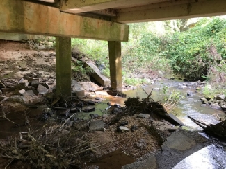 photo of bridge support and water