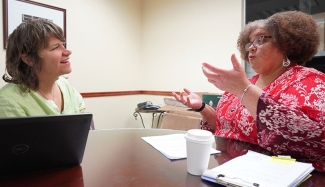 photo of two women in office