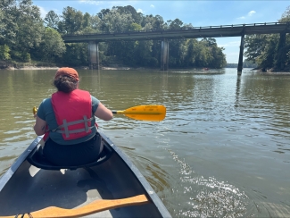 photo of kayaker on river