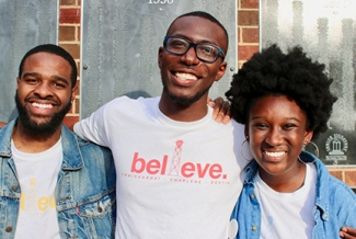 photo of three people, outside