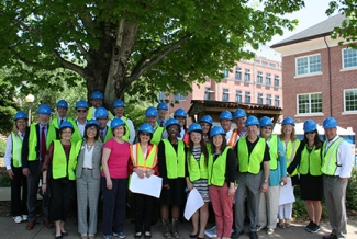 people in hard hats outdoors