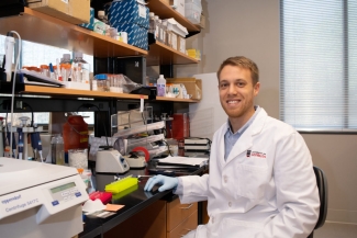 Photo of man in lab/office