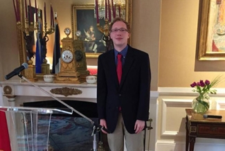 student in ornate room