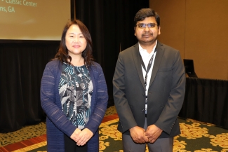 photo of two people in ballroom