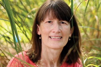 photo of woman with plants outside