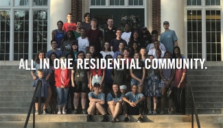 video still of group of students on steps of a building