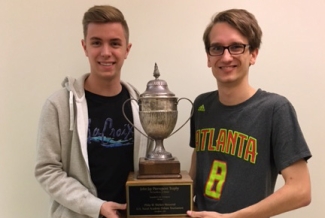 two men with trophy