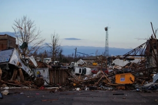 photo of damaged buildings and debris, day