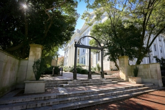 photo of arch and buildings, day