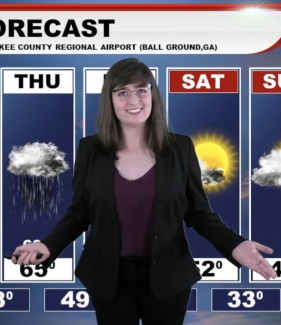 photo of woman in TV weather center