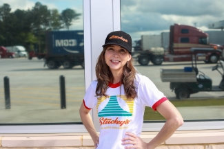 photo of woman outside a truckstop