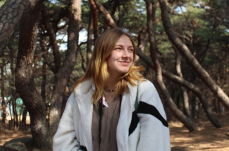 photo of woman, trees in background