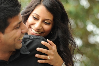 man and woman smiling