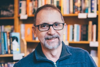 photo of man in bookstore