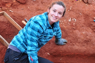 woman on archeological dig