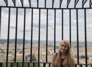 photo of woman infant of a view of Rome