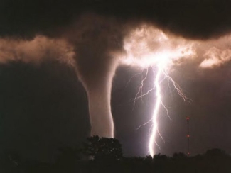 photo of lightning and a tornado funnel