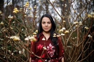 photo of woman with flower buds