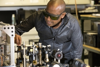 photo of man in lab with protective eyewear