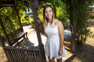 photo of woman with garden pergola 