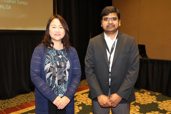 photo of two people in ballroom