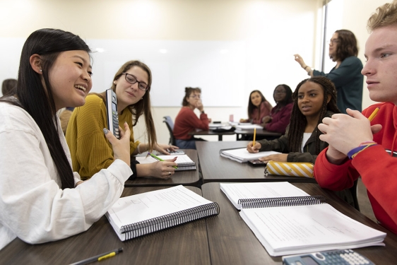 photo of students at a classroom table