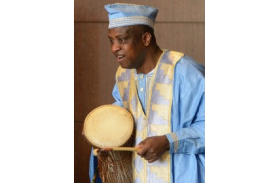 man with hand drum