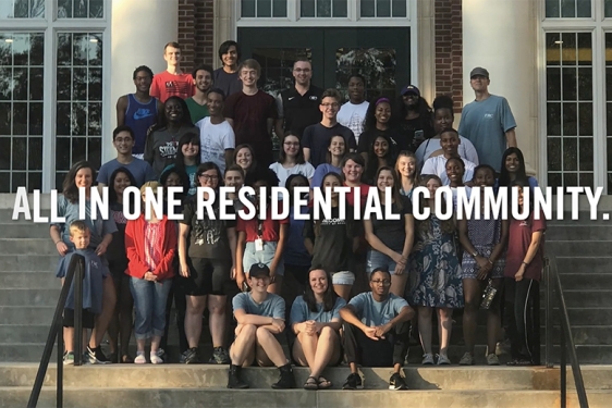 video still of group of students on steps of a building