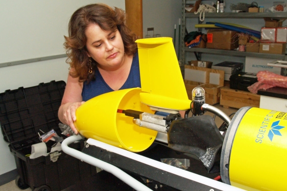 photo of woman with underwater robotic glider