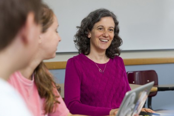 woman in classroom with students