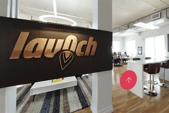 inside of an office space, with sign 'Launch'