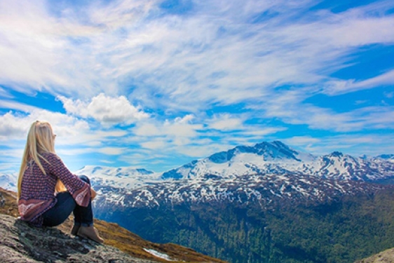 woman with mountain and sky