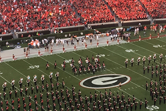 marching band at a football stadium, photo