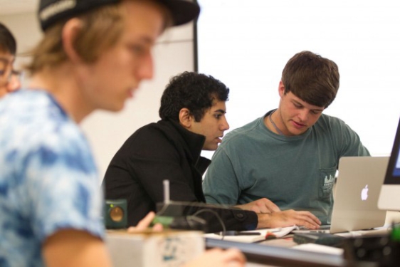 students in class, with laptop