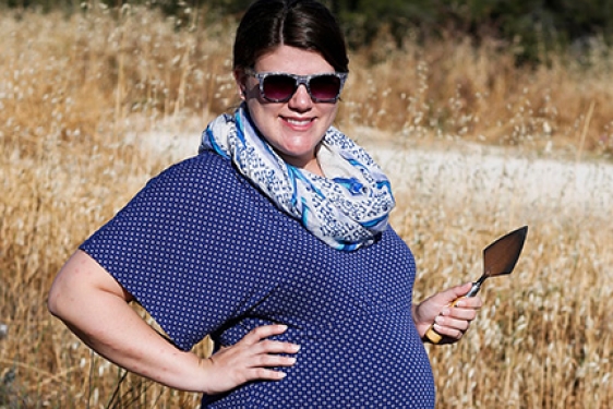 pregnant woman with trowel