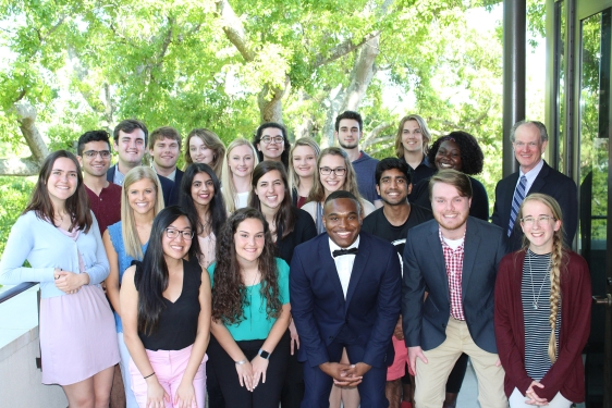 Photo of group on balcony, outdoors, day