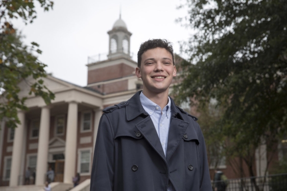 Photo of man in front of building (park hall)