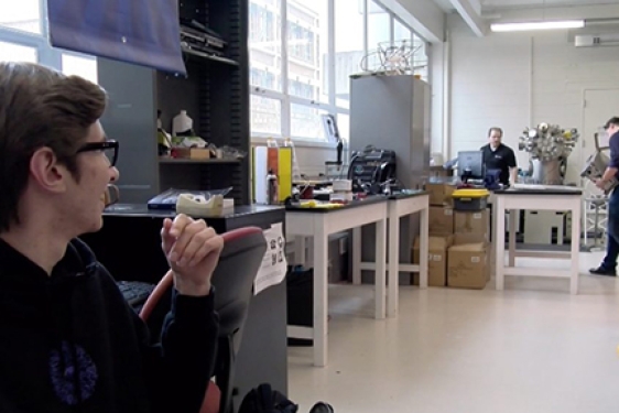 photo of students in a physics lab