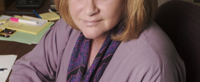 Photo of woman at desk