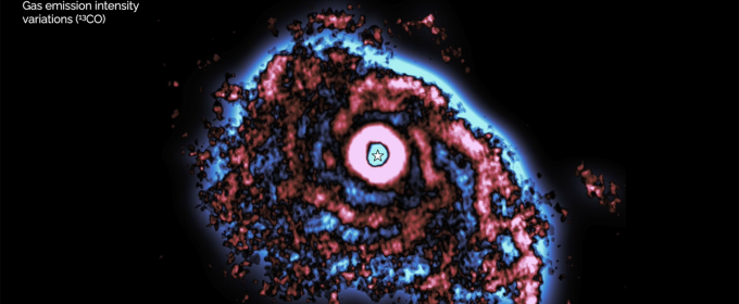 digital image of planetary disk, with blue, red, and space in black