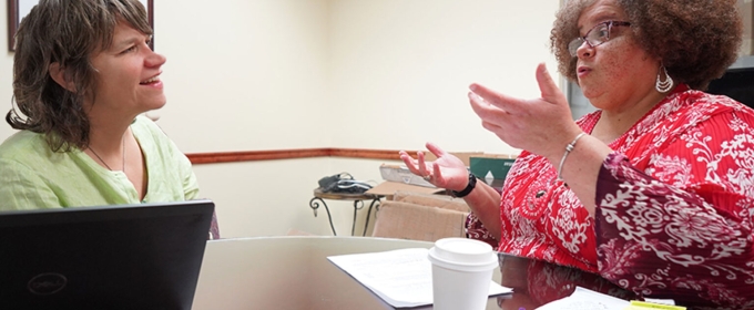 photo of two women in office