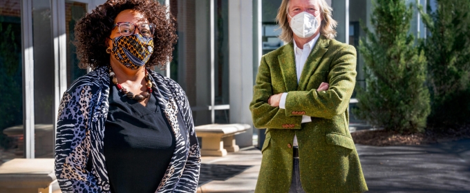 photo of two people wearing masks, outside