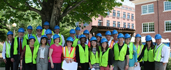 people in hard hats outdoors