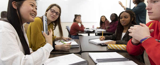 photo of students at a classroom table