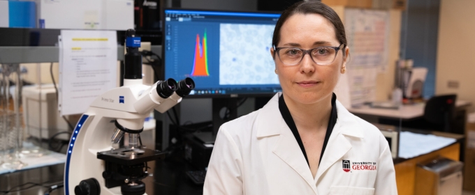 photo of woman in lab with computer 