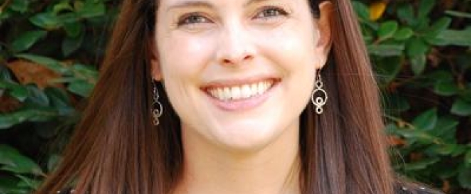 photo of woman, with foliage in background