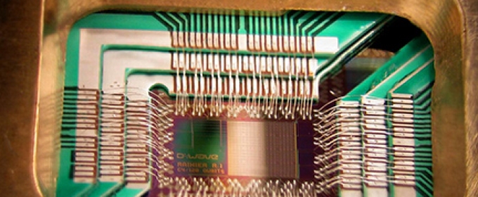 photo of computer chip and holder