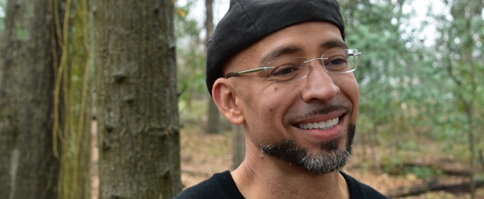 photo of man in forest, trees in background, day