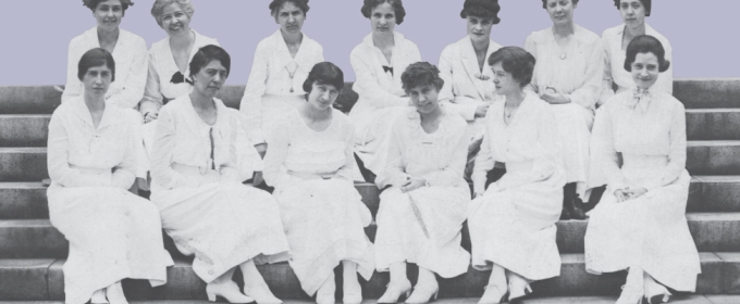 historical photo of women seated on steps