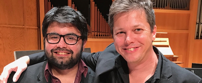 photo of two men in a concert hall